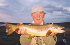 Wegg with a 5lb Brown Trout from a SUAC Loch